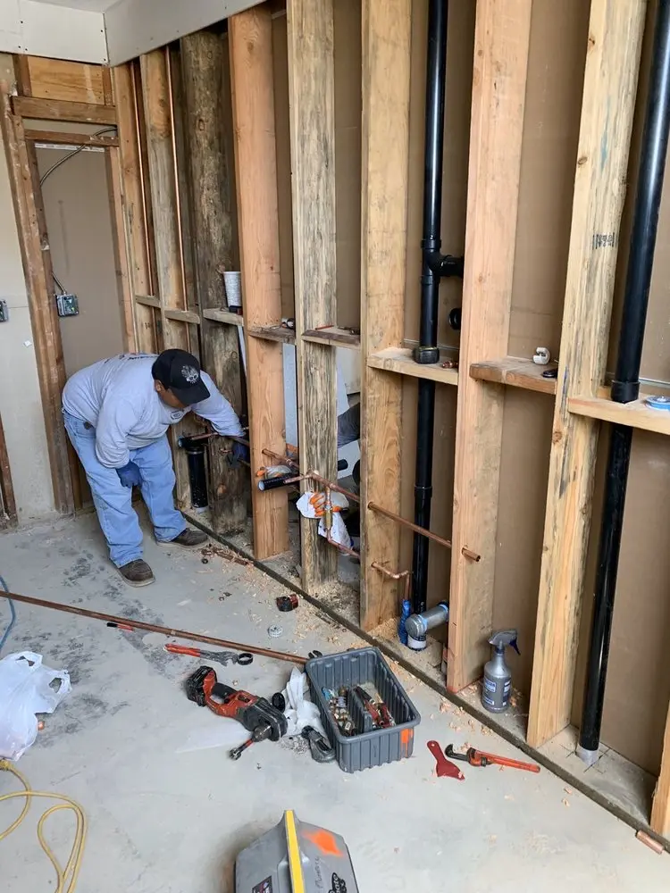 Commercial rough-in plumbing for Water Heater Replacement in Cameron